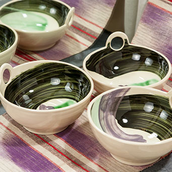 Set of stoneware dishes with brushed slip decoration