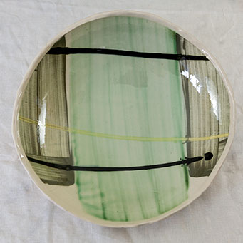 Free-form stoneware dish with brushed slip decoration