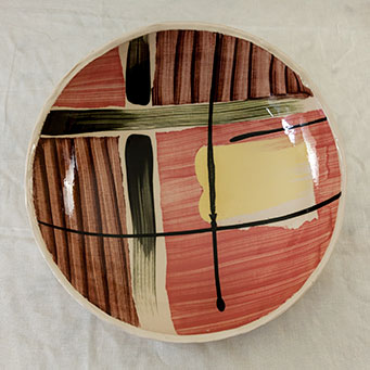 Free-form stoneware dish with brushed slip decoration